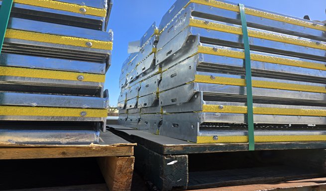 Galvanised stair treads with high-visibility anti-slip nosing